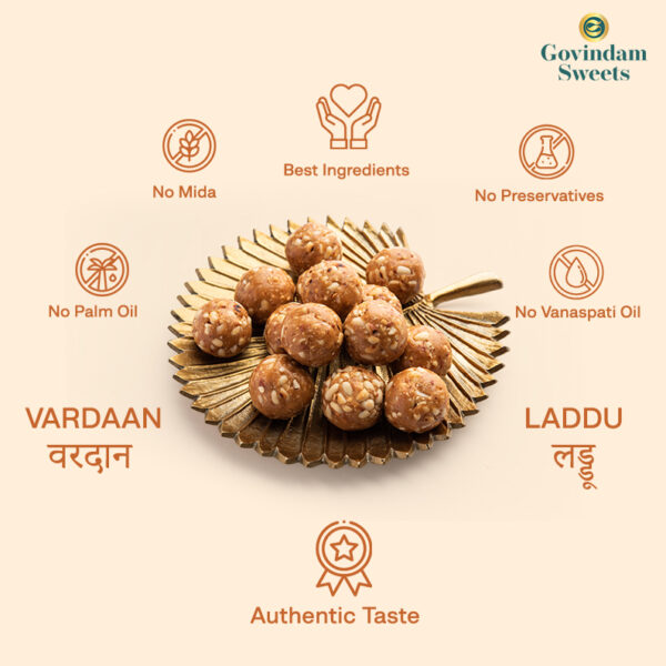 Close-up of Vardan Laddu showing rich dry fruit texture and golden color